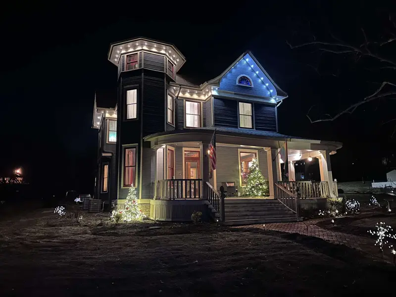 Victorian home lit up