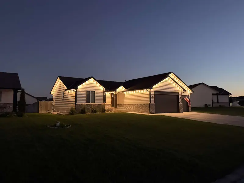 Home at dusk with warm lights