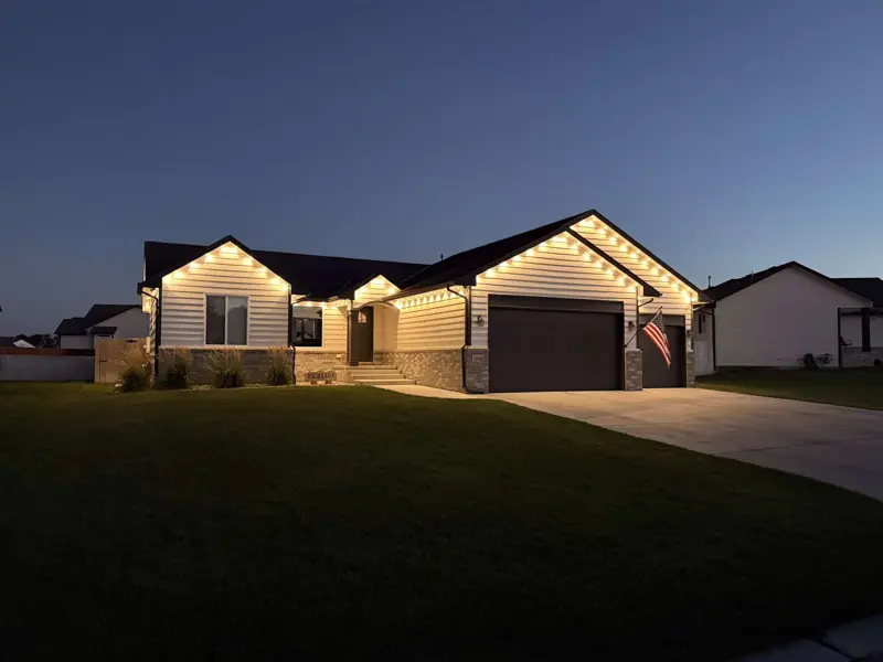 Two-gable home with warm lights